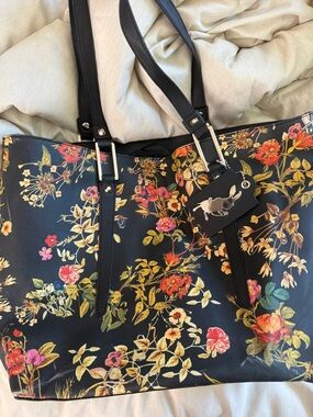 Colleen Atwood Alice through the Looking Glass black floral bag